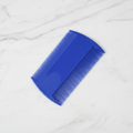 AuraComb Pro on white marble, minimalist product photography