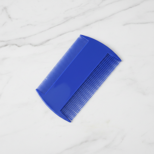 AuraComb Pro on white marble, minimalist product photography